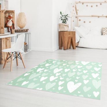 Vinyl-Teppich - Kleine und große gezeichnete Weiße Herzen auf Grün - Quadrat 1:1
