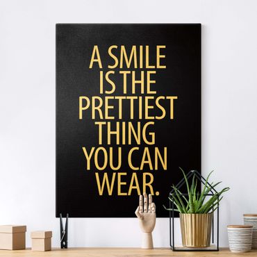 Leinwandbild Gold - A Smile is the prettiest thing Sans Serif Schwarz - Hochformat 3:4