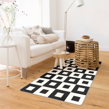 Teppich - Geometrisches Muster aus Schwarz Weißen Quadraten
