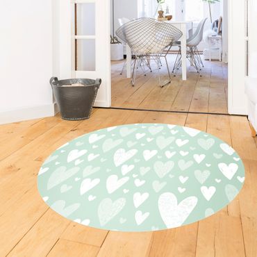 Runder Vinyl-Teppich - Kleine und große gezeichnete Weiße Herzen auf Grün