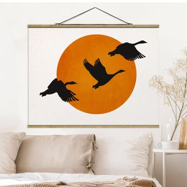 Stoffbild mit Posterleisten - Vögel vor gelber Sonne - Querformat