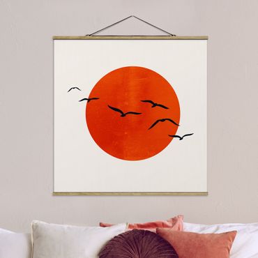 Stoffbild mit Posterleisten - Vogelschwarm vor roter Sonne I - Quadrat 1:1