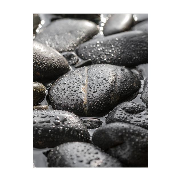 Teppich schwarz Schwarze Steine im Wasser