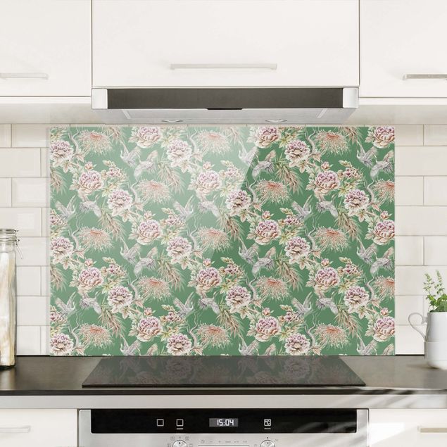 Glasrückwand Küche Muster Aquarell Vögel mit großen Blüten vor Grün