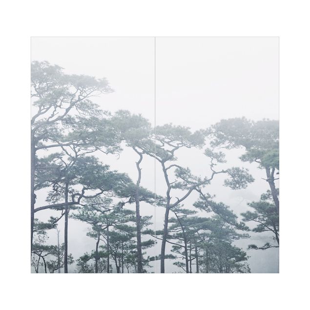 Duschrückwand - Baumkronen im Nebel