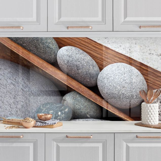 Platte Küchenrückwand Stillleben mit grauen Steinen