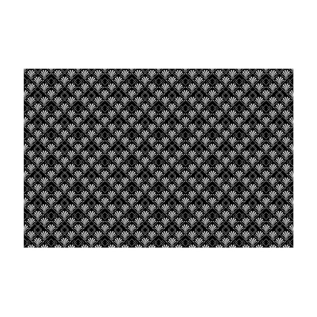Teppich schwarz-weiß Glitzeroptik mit Art Deco Muster auf Schwarz