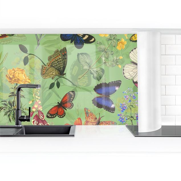 Küchenrückwand selbstklebend Schmetterlinge mit Blumen auf Grün