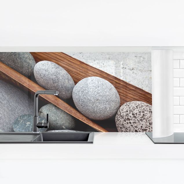 Küchenrückwand selbstklebend Stillleben mit grauen Steinen