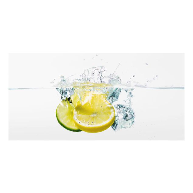 Spritzschutz Glas - Zitrone und Limette im Wasser - Querformat - 2:1