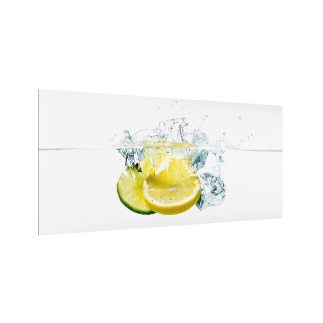 Spritzschutz Glas - Zitrone und Limette im Wasser - Querformat - 2:1