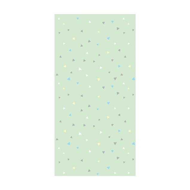 Moderner Teppich Bunte gezeichnete Pastelldreiecke auf Grün