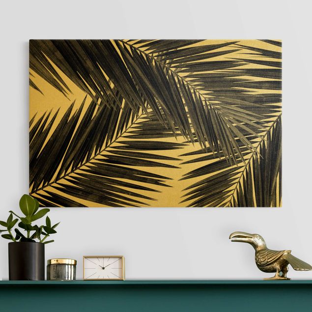 Leinwandbilder Gold Canvas Blick durch Palmenblätter Schwarz-Weiß