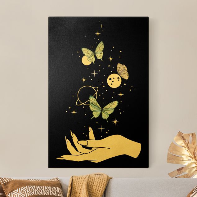 Leinwandbild Gold - Zaubernde Hand - Schmetterlinge und Planeten - Hochformat 3:2