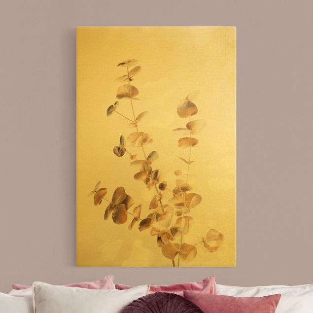 Blumenbilder auf Leinwand Goldene Eukalyptuszweige mit Weiß
