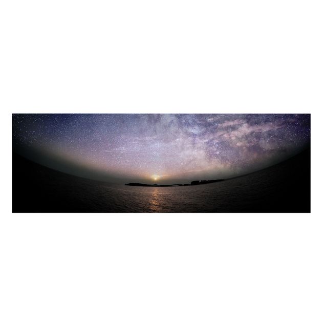 Leinwandbild - Sonne und Sternenhimmel am Meer - Panorama 1:3