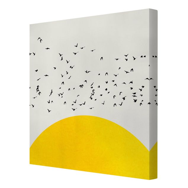 Wandbilder Vogelschwarm vor gelber Sonne