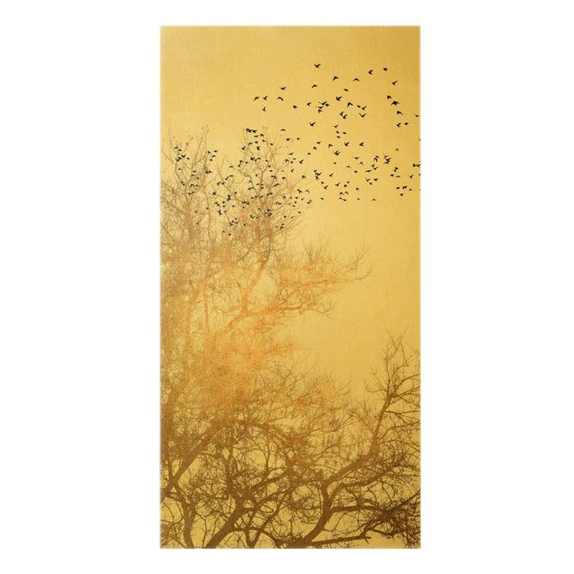 Tierbilder Leinwand Vogelschwarm vor goldenem Baum