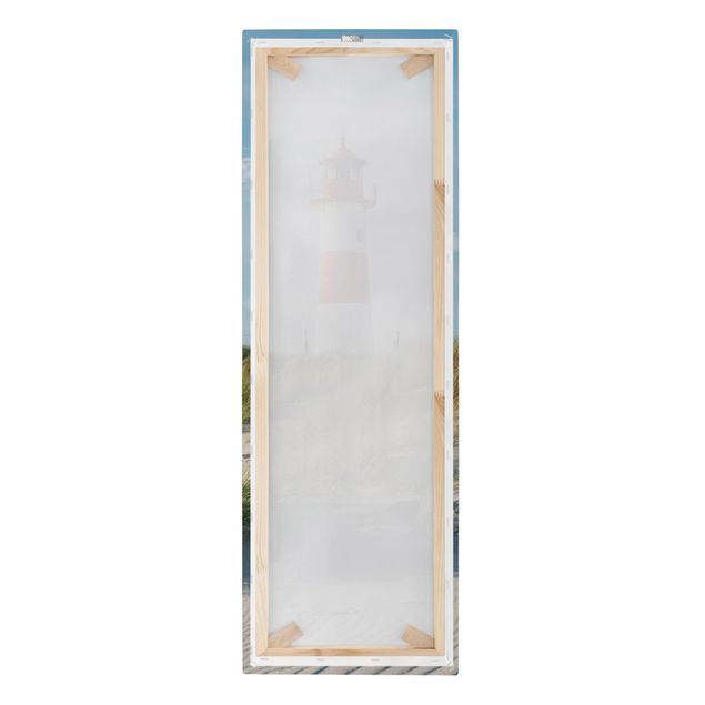 Leinwandbild - Leuchtturm an der Nordsee - Panorama Hochformat 1:3