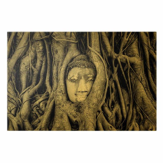 Leinwandbild Gold - Buddha in Ayuttaya von Baumwurzeln gesäumt in Schwarzweiß - Querformat 2:3