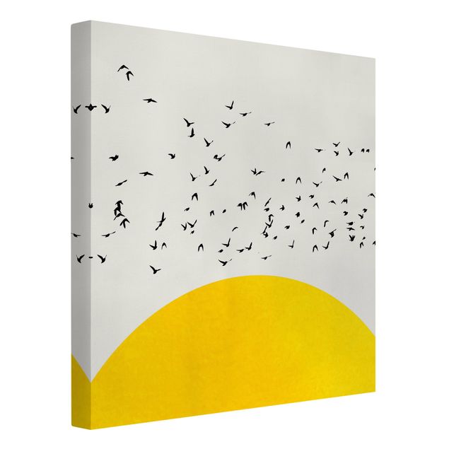 Leinwandbilder Tiere Vogelschwarm vor gelber Sonne