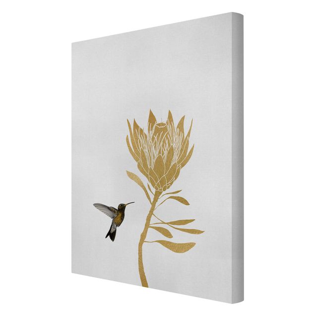 Leinwandbild - Kolibri und tropische goldene Blüte - Hochformat 2:3