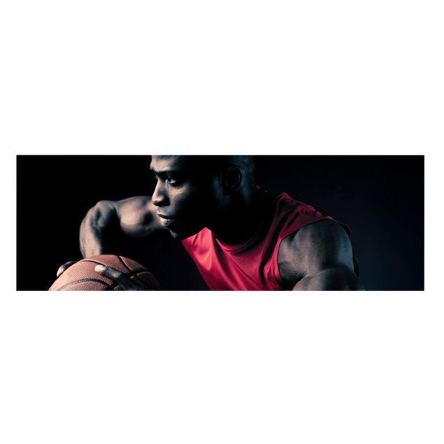 Leinwandbild - Nahaufnahme eines Basketballers - Panorama Quer