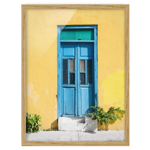 gerahmte Bilder Bunte Wand blaue Tür