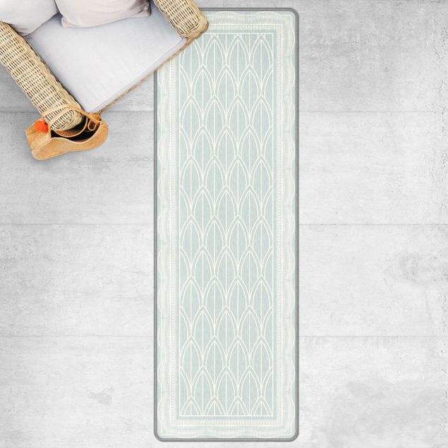 Teppich pastell Art Deco Federn Muster mit Bordüre