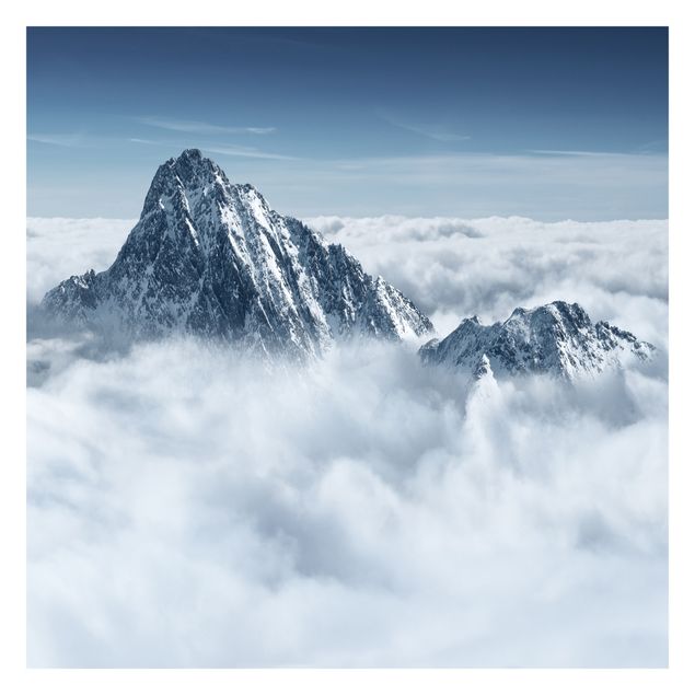 Fototapete selbstklebend Die Alpen über den Wolken