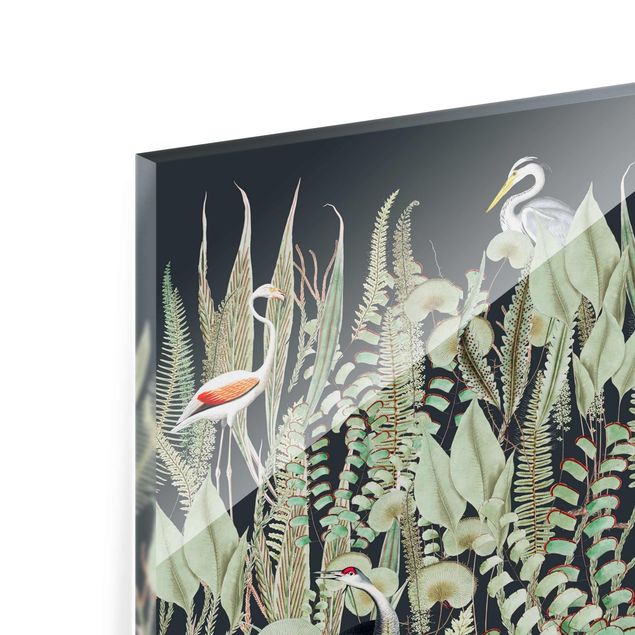 Glasbild - Flamingo und Storch mit Pflanzen auf Grün - Querformat