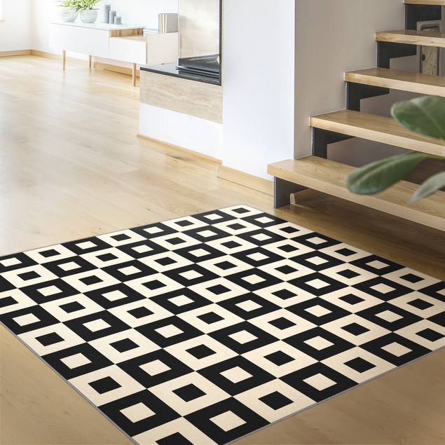 Moderner Teppich Geometrisches Muster aus Schwarz Beigen Quadraten