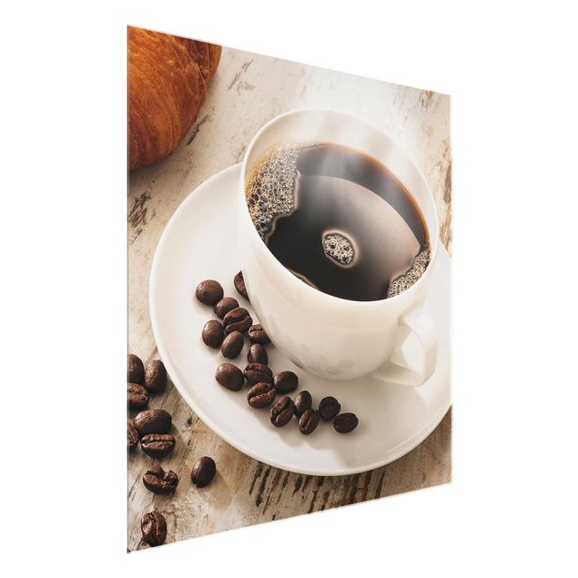 Glasbild - Dampfende Kaffeetasse mit Kaffeebohnen - Quadrat 1:1