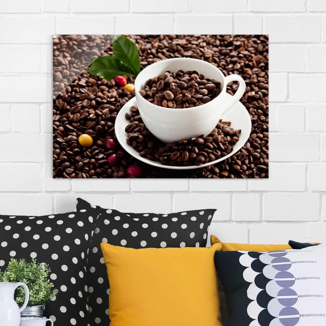 schöne Bilder Kaffeetasse mit gerösteten Kaffeebohnen
