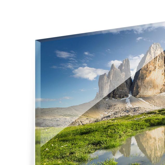 Glasbild - Südtiroler Zinnen und Wasserspiegelung - Panorama Quer