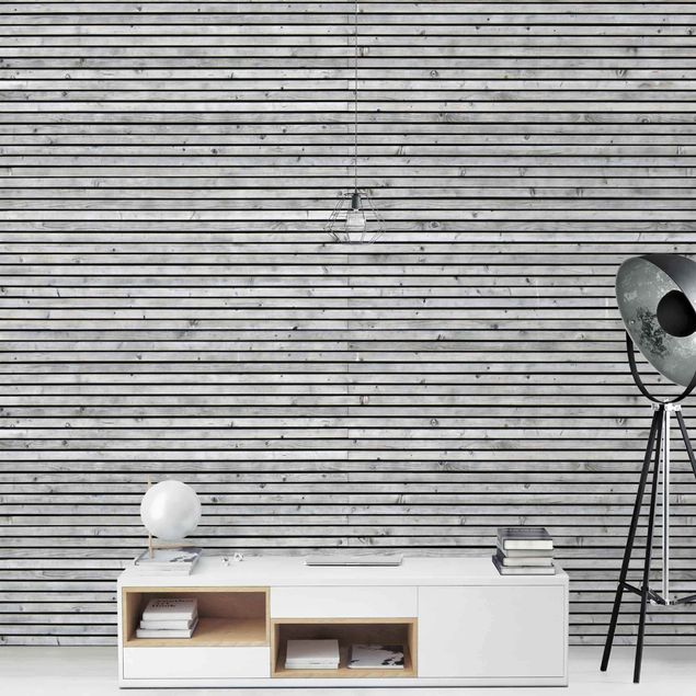 Fototapete selbstklebend Holzwand mit schmalen Leisten schwarz weiß
