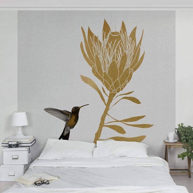 Design Tapeten Kolibri und tropische goldene Blüte