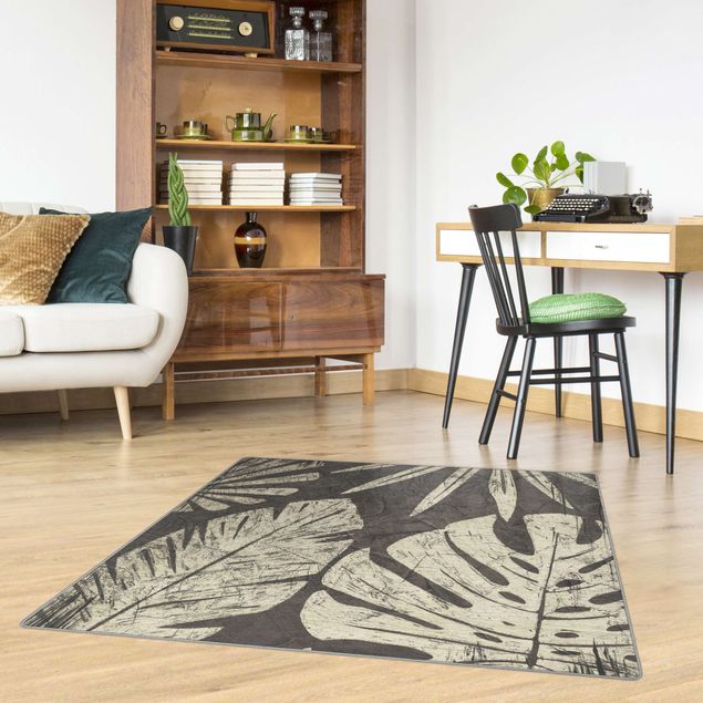 Moderne Teppiche Palmenblätter vor Dunkelgrau
