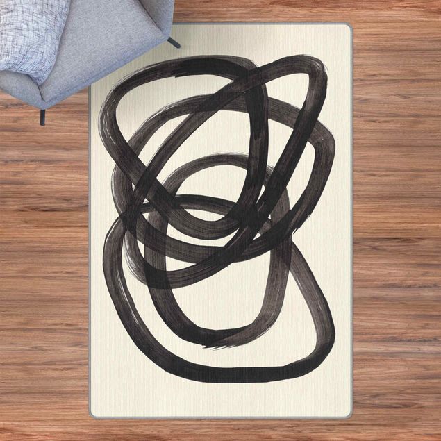 Teppich schwarz-weiß Schwarze Spiralen
