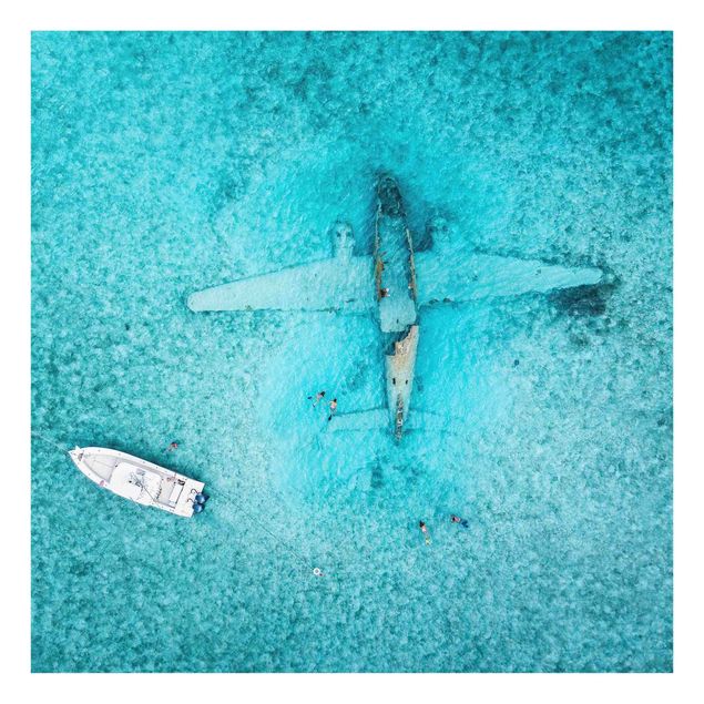 Glasbilder Top View Flugzeugwrack im Meer