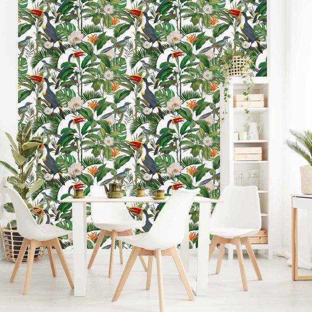 Design Tapeten Tropischer Tukan mit Monstera und Palmenblättern