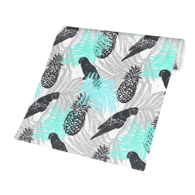 Pattern Design Tropisches Muster mit Ananas und Papageien Türkis