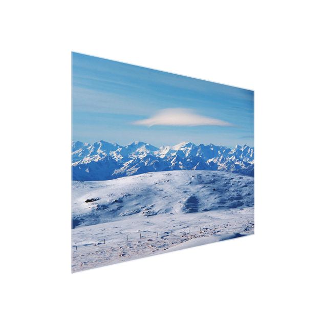 Glasbilder Verschneite Bergwelt