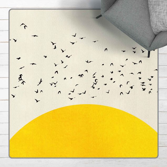 Teppich gelb Vogelschwarm vor gelber Sonne