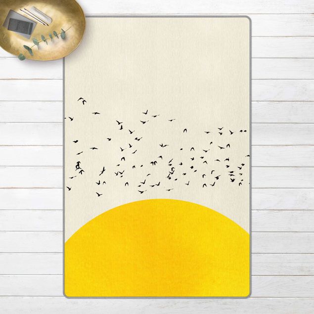 Teppich gelb Vogelschwarm vor gelber Sonne