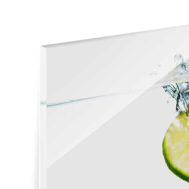 Spritzschutz Glas - Zitrone und Limette im Wasser - Panorama - 5:2