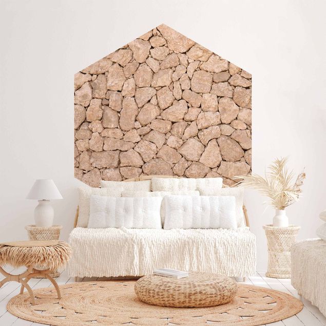 Hexagon Fototapete selbstklebend - Apulia Stone Wall - Alte Steinmauer aus großen Steinen