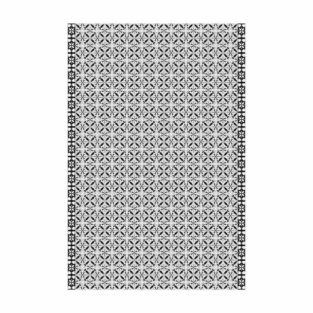 Teppich schwarz-weiß Geometrischer Fliesenmix Blüte Schwarz