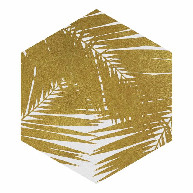 Hexagon Mustertapete selbstklebend - Blick durch goldene Palmenblätter