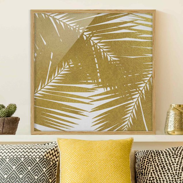 Moderne Bilder mit Rahmen Blick durch goldene Palmenblätter